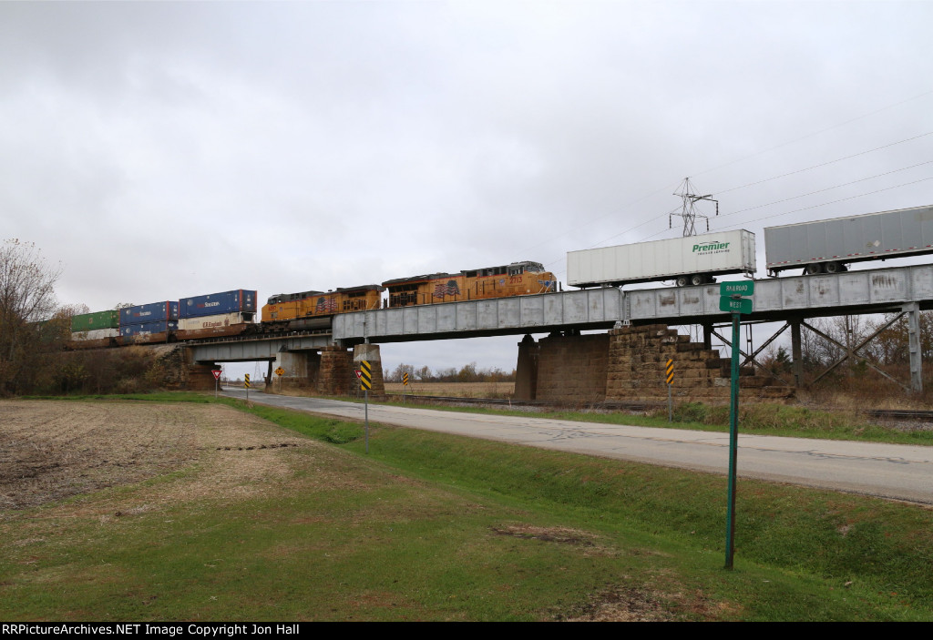 The mid train DPU's of ZCIG4 come east over the bridge